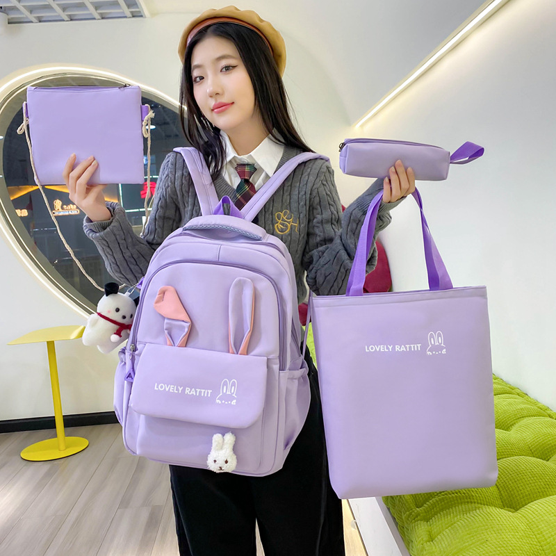 Cute and large-capacity backpack for primary school students, a backpack that reduces burden and protects the spine, a rabbit ear casual four-piece set for girls details Picture