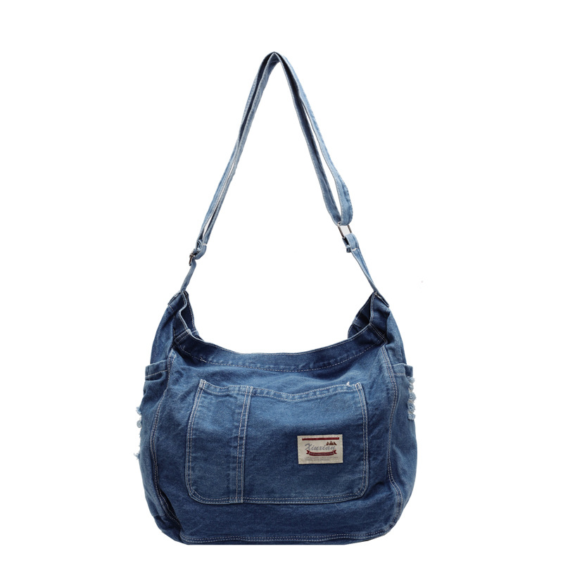 A versatile new single-shoulder bag with large capacity, a denim autumn and winter lightweight, retro and fashionable school-style crossbody bag Item Picture