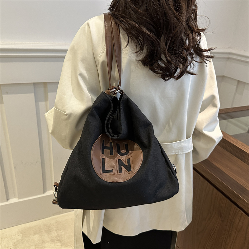 Women's large-capacity 2024 new letter-shaped canvas bag, fashionable single-shoulder bag, versatile commuter college student tote bag full figure