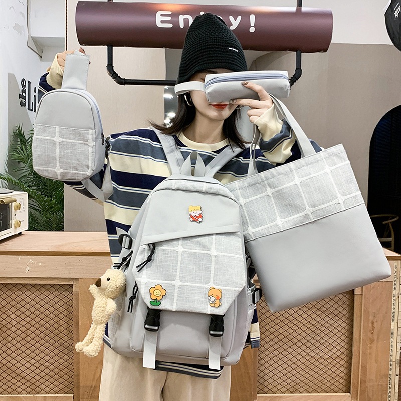 Wholesale of new Korean-style fashionable canvas checkered backpacks for women with spine protection and wear resistance Application Scenario