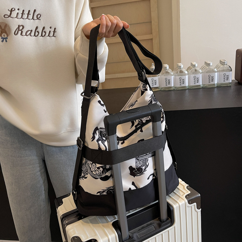 Cross-border wholesale women's bags, outdoor travel Chinese-style single-shoulder tote bags, large-capacity Chinese knot multi-functional backpacks Application Scenario