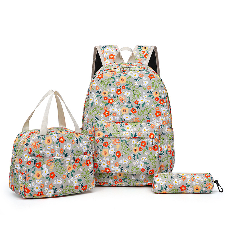 Wholesale of new schoolbags for girls, fresh Korean version junior high school students, large-capacity Japanese-style floral campus casual backpacks Item Picture