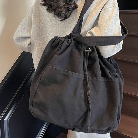 2025 New solid color, large capacity, niche design, fashionable and versatile single-shoulder bag, handbag, drawstring, class bag details Picture