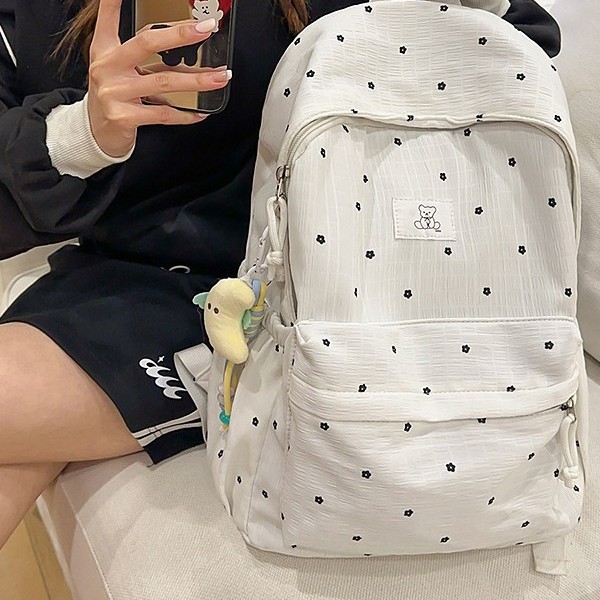 This new cute and ins-style polka dot backpack is lightweight for girls and versatile for students' school bags with a large capacity Application Scenario