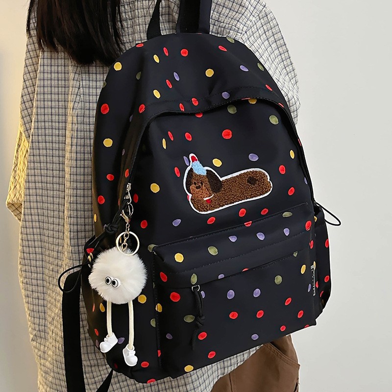 New cute puppy colorful polka dot student lightweight, trendy and versatile backpack with large capacity, reducing burden and protecting the spine Application Scenario