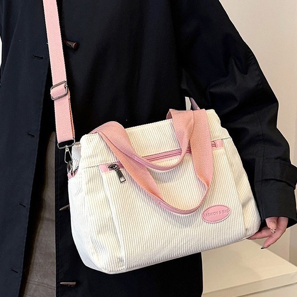 Retro and simple large-capacity corduroy fabric bag, women's hand-held shoulder crossbody bag, multi-compartment commuting bag, multi-functional bag Application Scenario