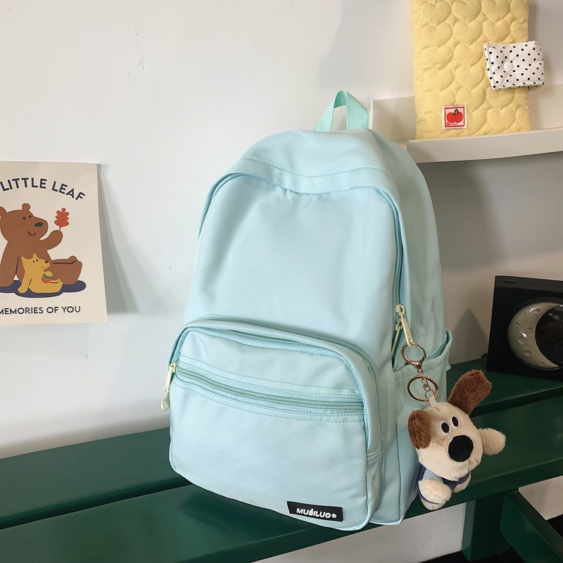 The new Korean-style casual backpack is a fresh and sweet schoolbag for high school students' classes and a fashionable solid-color travel backpack for girls details Picture