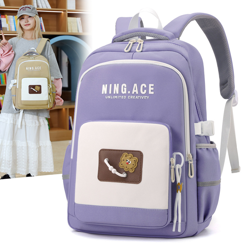 A male student in grades 3 to 5 with a large-capacity backpack that reduces the burden full figure