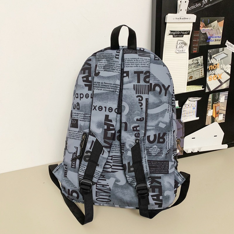 A new 2024 personalized graffiti backpack for middle school students, a Japanese trendy brand travel backpack for college students and couples Specification drawing