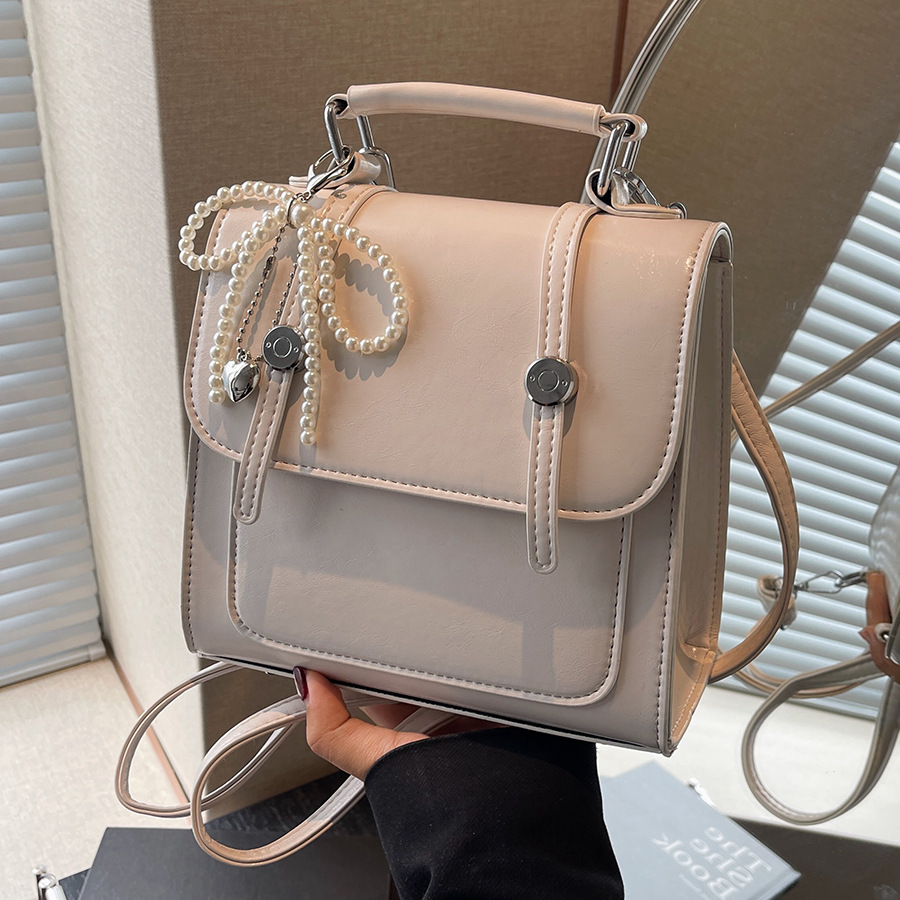 The 2024 new style of the "Bag Girl" is a trendy Korean-style commuting American retro hot girl solid-color fashionable single-shoulder crossbody handbag full figure