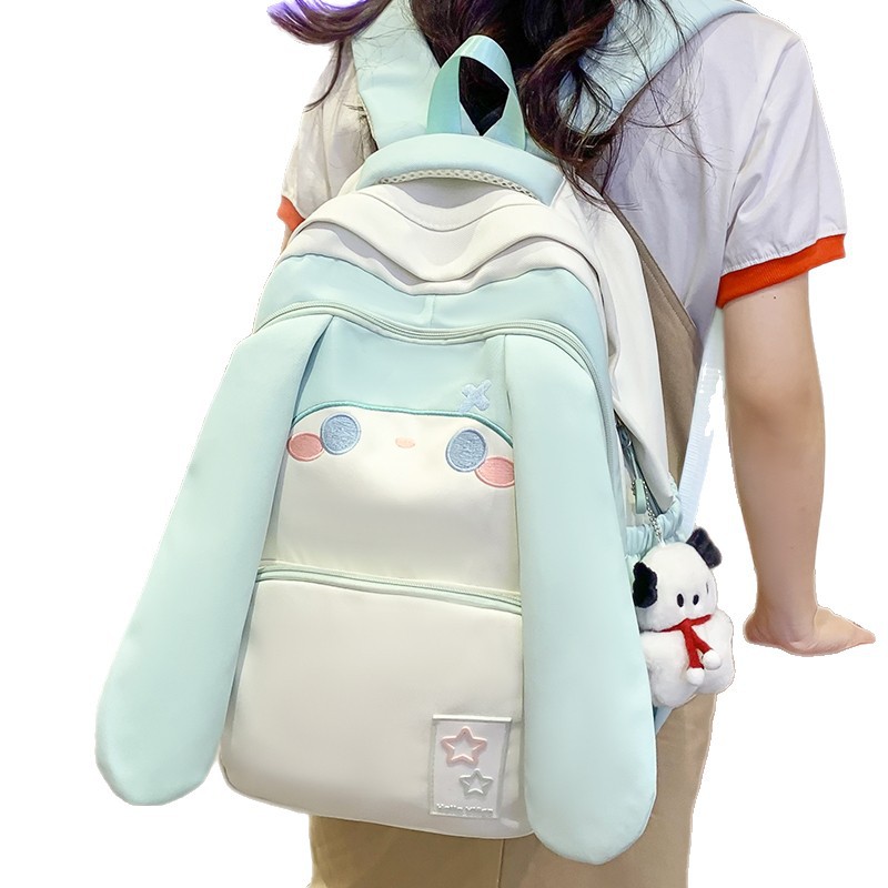 Big Eared Dog schoolbag for girls in grades three to six of primary school, large capacity, cute backpack for junior high school girls, children's backpack Item Picture