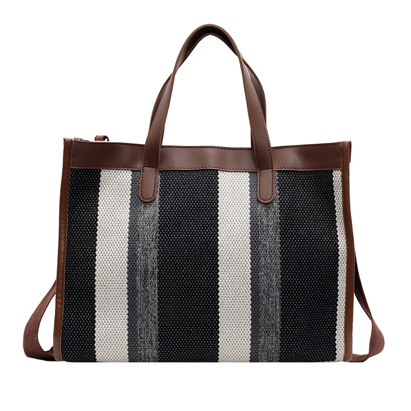 Large-capacity commuter bag for women, new autumn/winter 2024 striped canvas bag, casual single-shoulder tote bag, travel handbag Item Picture