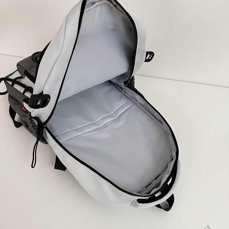 A new large-capacity schoolbag for women, a cool and trendy couple's casual backpack, and a Korean version of an Instagram computer backpack for junior and senior high school students Application Scenario