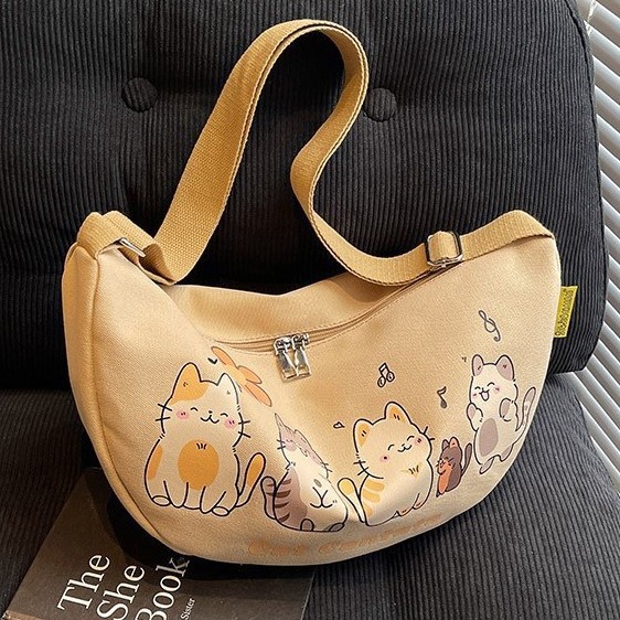 New versatile canvas single-shoulder bag for commuting, student ins Korean style, laid-back style, cartoon and cute underarm bag, crossbody bag Application Scenario