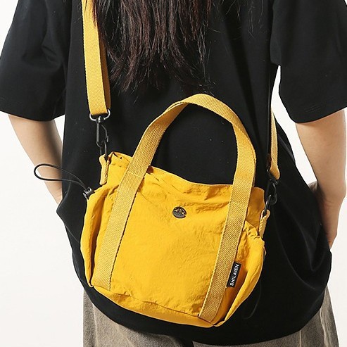 New cross-border versatile large-capacity handbag, women's single-shoulder bag, simple commuting bucket bag, student trendy tote bag Application Scenario