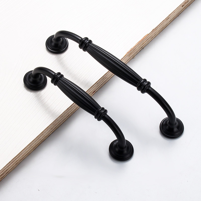 Wholesale of black aluminum alloy thickened solid single-hole handles for cabinets, wardrobe door handles and furniture hardware from the manufacturer details Picture