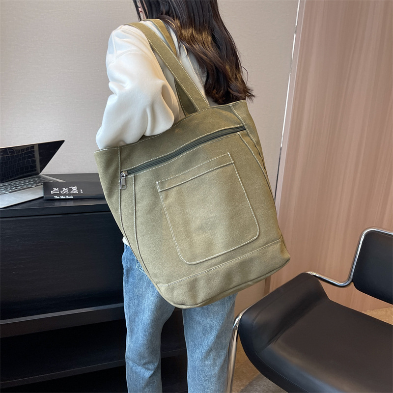 New canvas bag, simple and casual solid color women's bag 2025, large-capacity tote bag, campus student make-up class bag Specification drawing