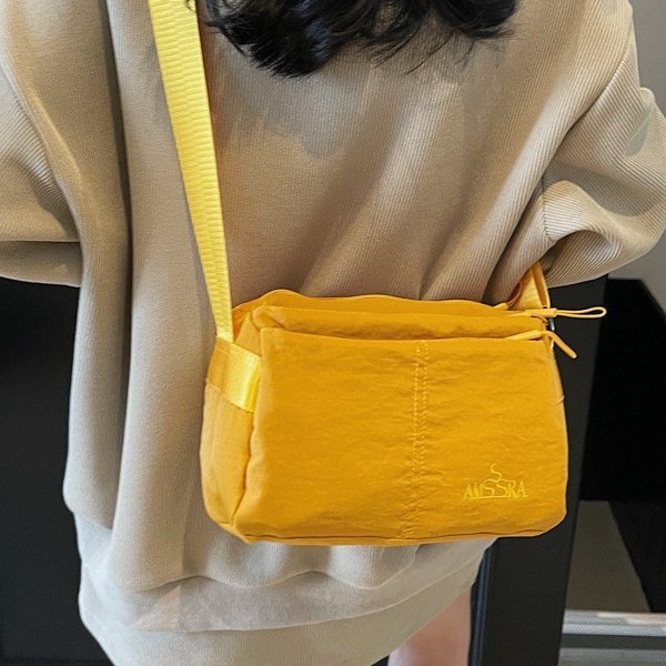 Cross-border crossbody bag, solid color storage bag, ultra-light fabric bag, water-resistant walking bag, simple small square bag, high appearance level crossbody bag details Picture