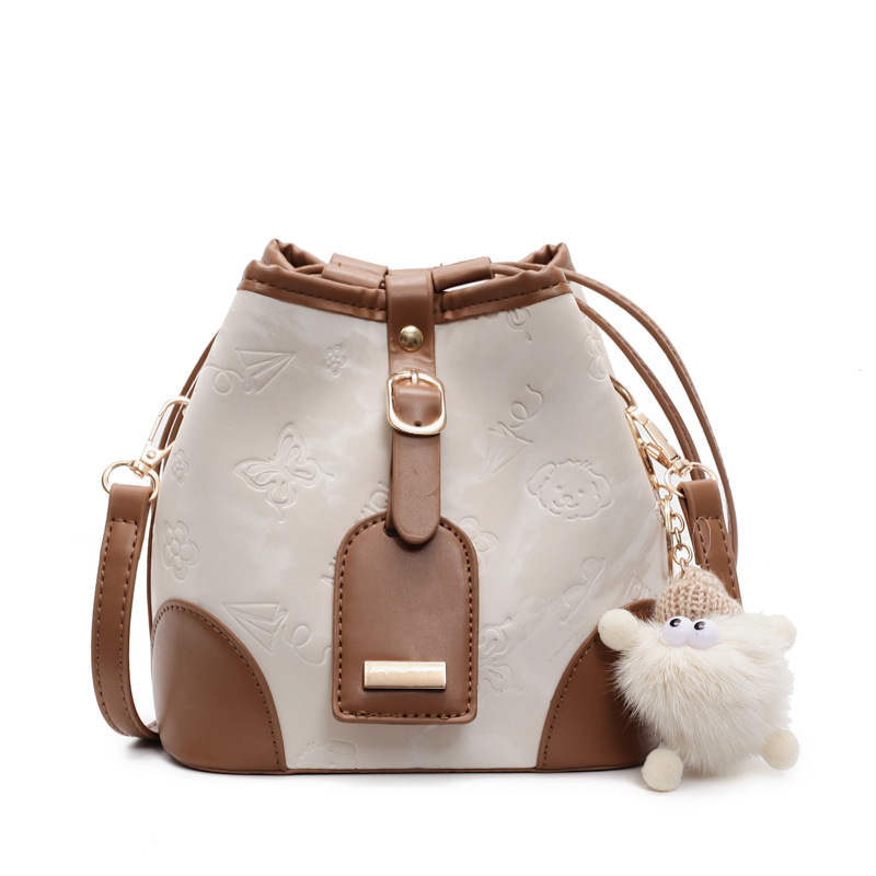 The color-blocking bucket bag is a new trendy and fashionable single-shoulder bag for women in 2025. It is a casual and versatile Korean-style crossbody bag with a patchwork texture Item Picture