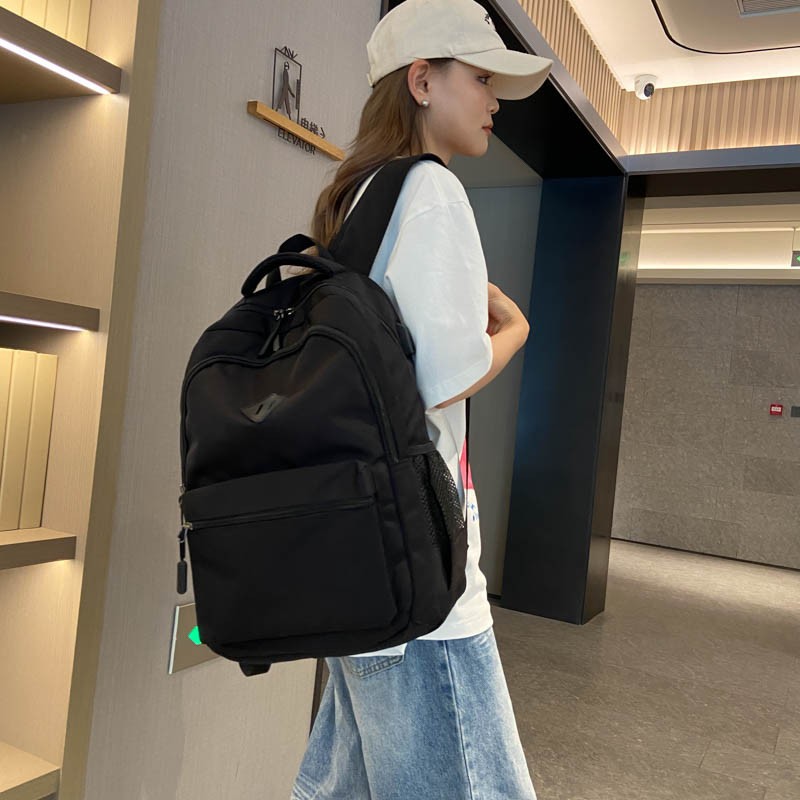 Trendy backpack, durable, simple and large-capacity backpack, junior high school computer bag, and casual schoolbag for college students full figure