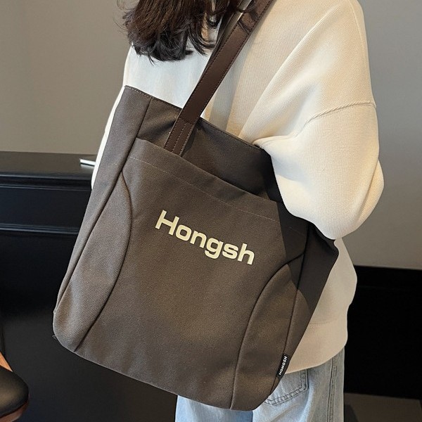Korean-style fashionable casual color-blocking bag with letter print, high-end hand-held tote bag, color-blocking versatile single-shoulder bag details Picture