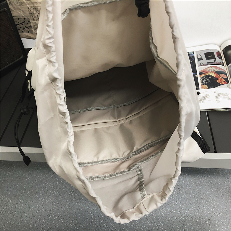 The new schoolbag is a high-appearance-level backpack for female college students and a large-capacity, fashionable and trendy backpack for men's commuting and travel Application Scenario