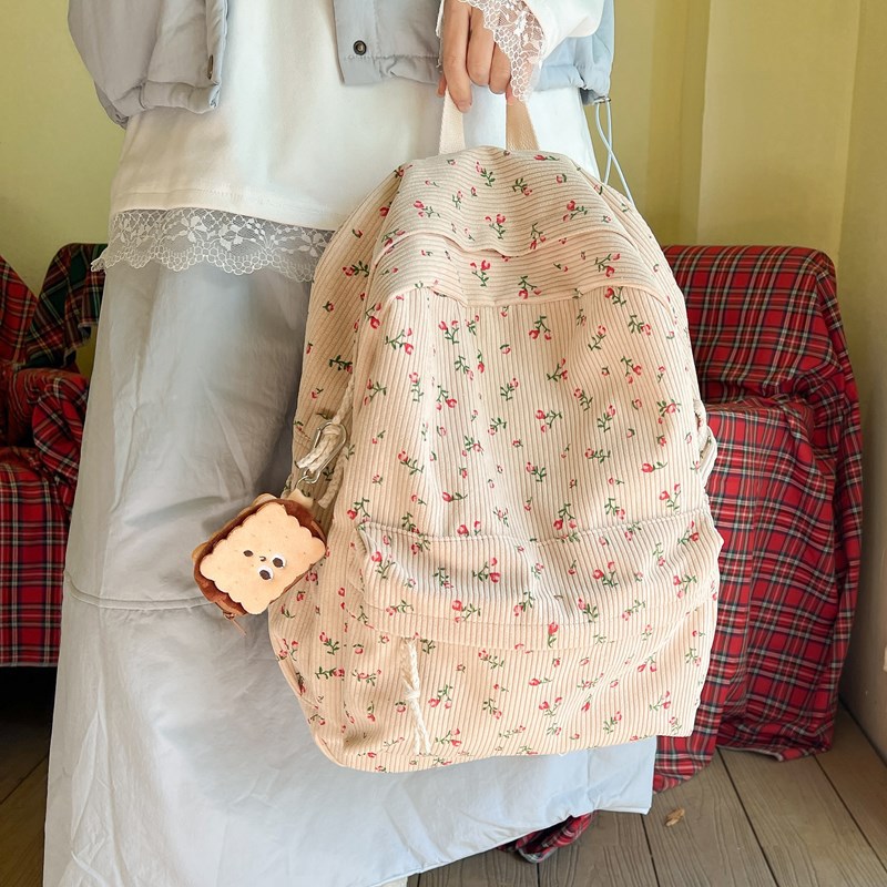 Japanese-style ins small flower schoolbag for girls, junior high school and senior high school students, corduroy design sense, unique and versatile backpack for girls Application Scenario