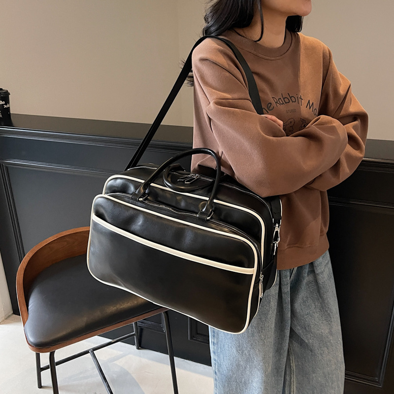 Large-capacity hand-held soft leather-like travel bag, business trip short-distance luggage bag, multi-layer storage, outdoor sports bag Specification drawing