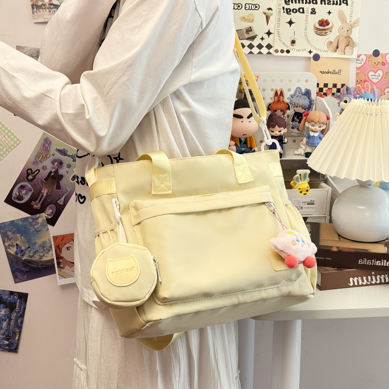 Korean-style solid-color Harajuku windsail bag, a fresh and simple daily crossbody bag, a versatile single-shoulder bag for classes, tutoring and commuting Application Scenario