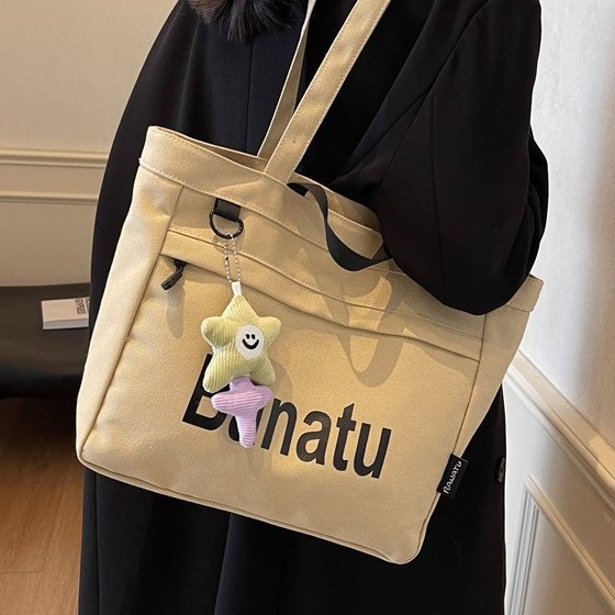 Large-capacity student handbag, canvas, large-capacity casual commuting, new school style, versatile single-shoulder for 2024 autumn and winter details Picture