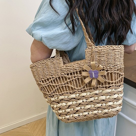 Large-capacity women's 2025 new style fashionable woven straw bag, summer hand-carry bag for seaside vacation details Picture