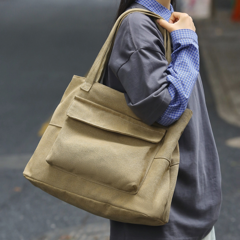 A Japanese solid-color large-capacity single-shoulder bag, a new retro and simple tote bag for the autumn and winter of 2024, a versatile student class bag Specification drawing