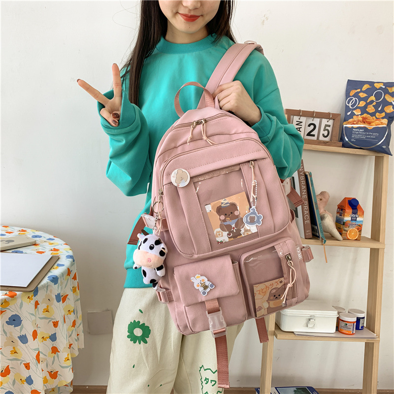 New Korean version fashionable backpacks for girls, trendy backpacks for students in grades three to six, and wholesale backpacks for junior high school students full figure