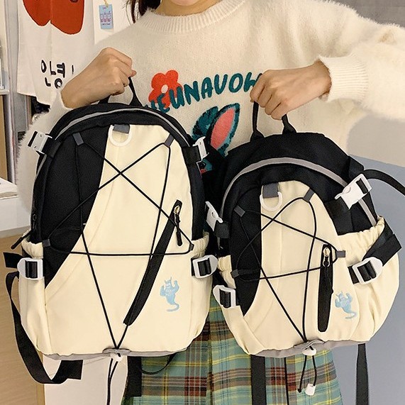 2024 New large-capacity spliced American-style schoolbag for junior high school students, high appearance level, casual and simple double-shoulder backpack for girls details Picture