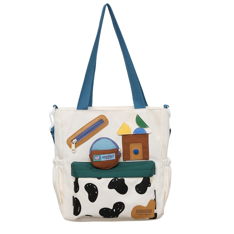 The new autumn 2024 collection features a cute single-shoulder crossbody bag with cow print, a student handbag, and a fun children's tutorial bag with a large capacity Item Picture