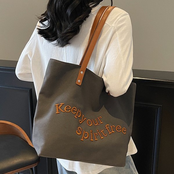 Canvas bag for women, 2025 new Korean version, large-capacity single-shoulder bag for work, embroidered letter tote bag for college students' classes details Picture