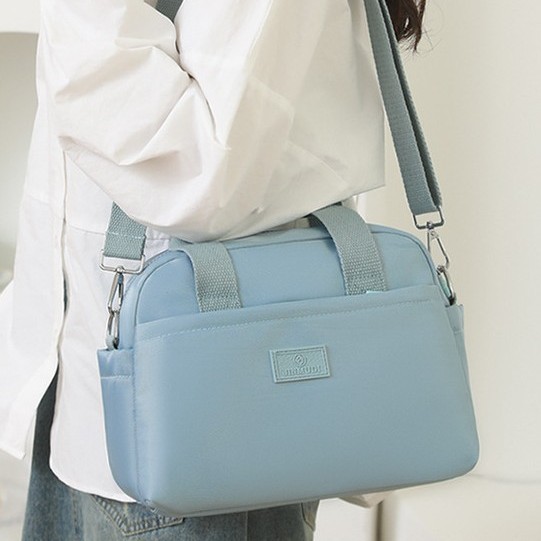 Lightweight and large-capacity single-shoulder women's bag 2025 Spring New cross-border trend solid color nylon fabric hand-held crossbody bag full figure