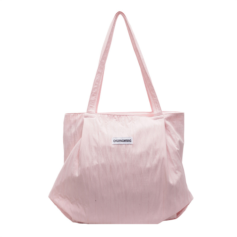 The 2024 new, versatile and laid-back tote bag is a unique and versatile Korean large-capacity student single-shoulder commuter bag Item Picture