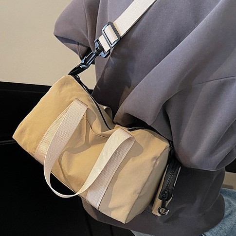 Solid-color zipper single-shoulder bag, commuter bucket bag, tote bag, underarm niche trendy single-shoulder, internet-famous crossbody bag details Picture