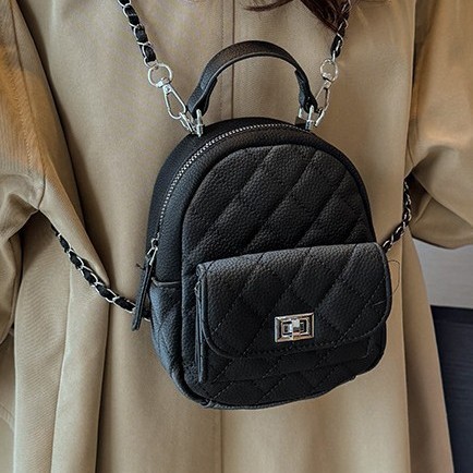 A new mini diamond-shaped chain backpack for women with a unique and fashionable Korean style. It is a multi-purpose bag details Picture