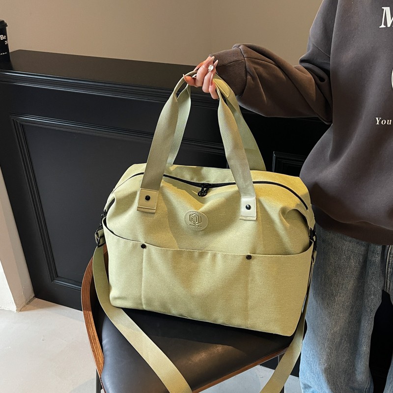 Lightweight travel bag with a pull handle, outdoor casual sports and fitness bag, simple Korean-style fashionable yoga and swimming training bag full figure