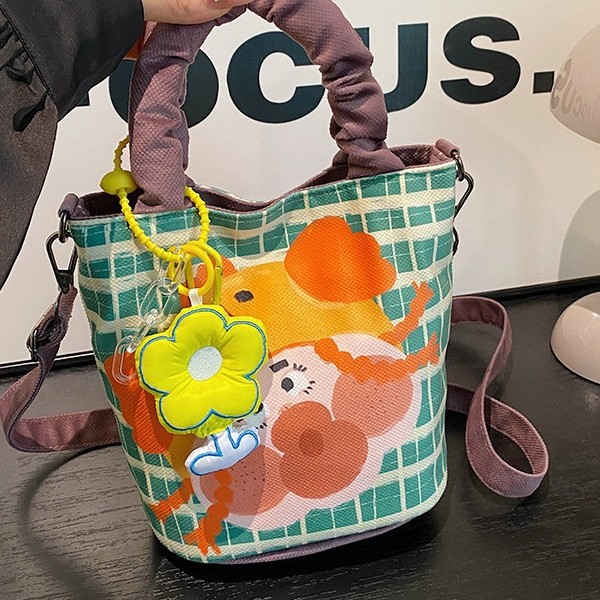 Funny and cute graffiti illustration bag, personalized casual bucket bag, large-capacity handbag, Japanese-style versatile crossbody bag details Picture