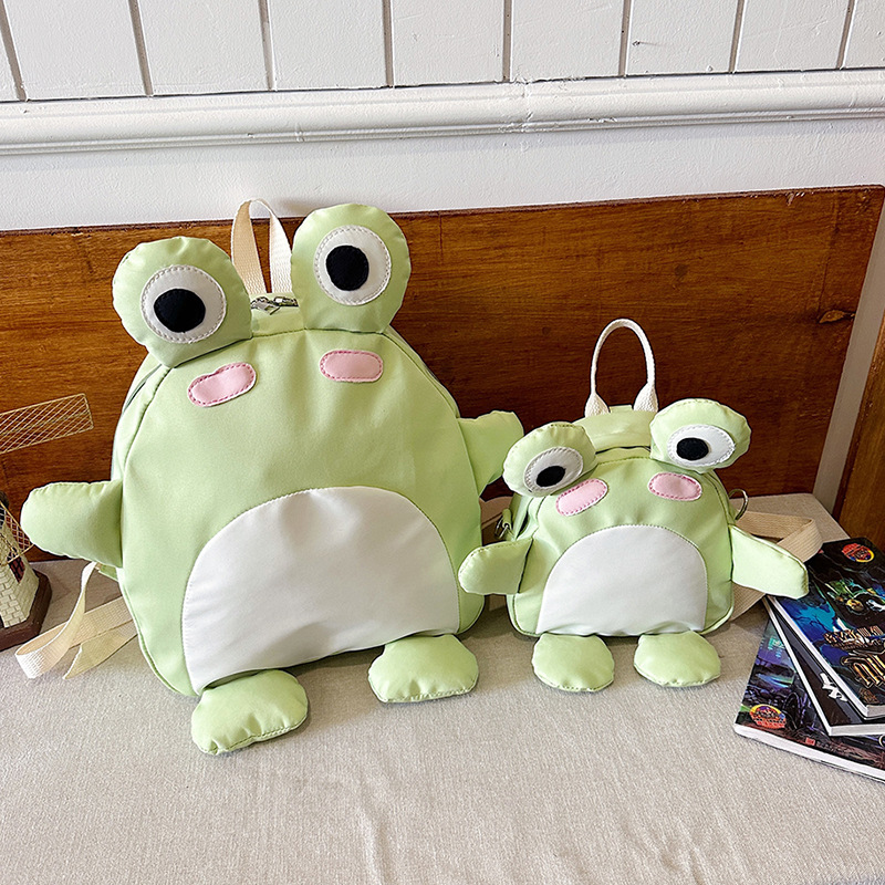 This three-dimensional and cute little frog cartoon backpack is a must-have for girls and versatile. It's a trendy small backpack for students' daily storage full figure