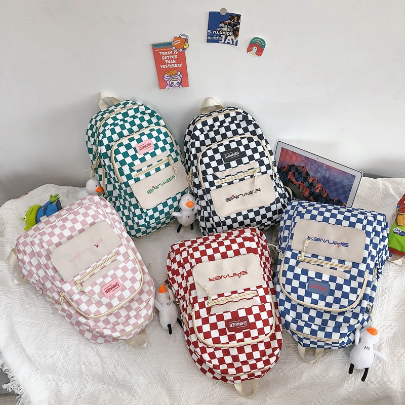 New autumn and winter ins checkerboard backpack for girls, Korean version for junior and senior high school students, large-capacity Haraju-style backpack Application Scenario