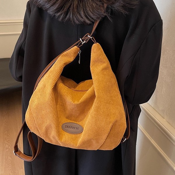 A large-capacity corduroy bag for women, a new 2024 trendy and versatile crossbody bag, a tote bag that students often use for commuting to school details Picture