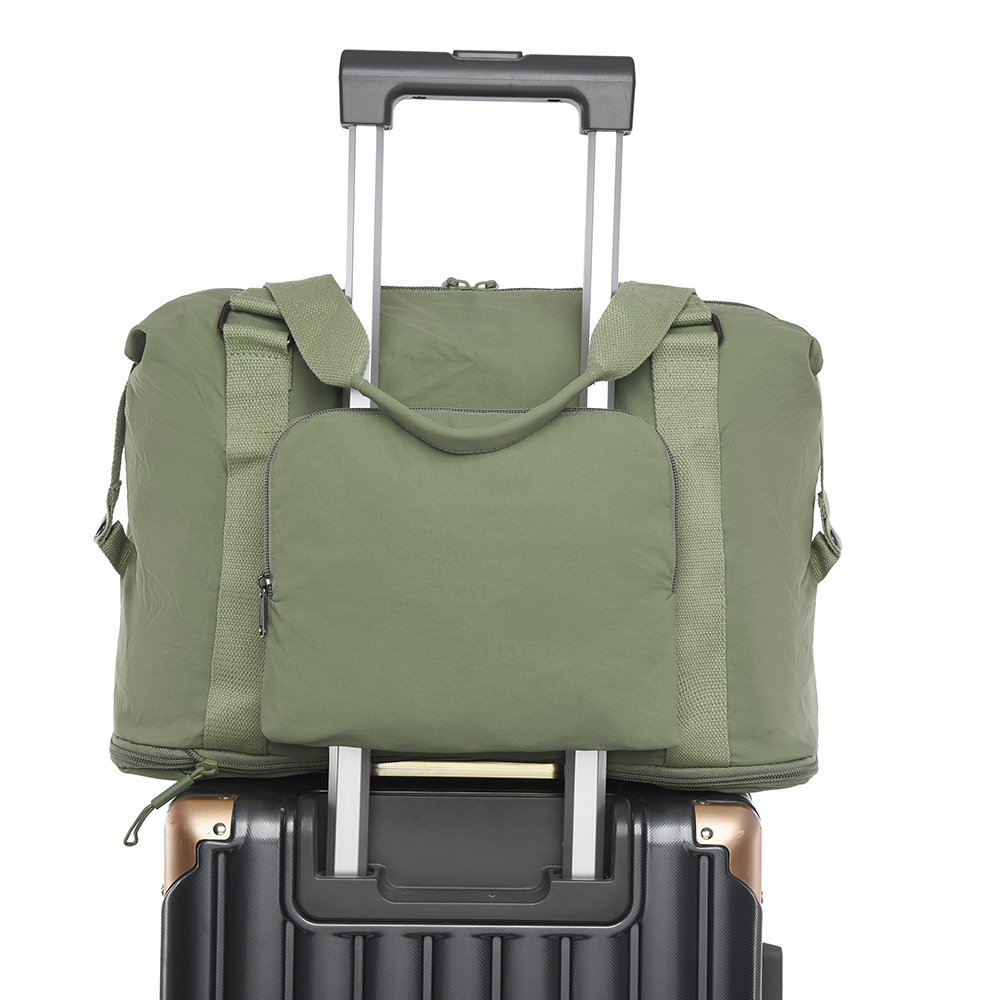 Foldable and expandable sports and fitness bag, large-capacity hand-held travel bag for women's outings, and a portable luggage bag with a pull handle Item Picture