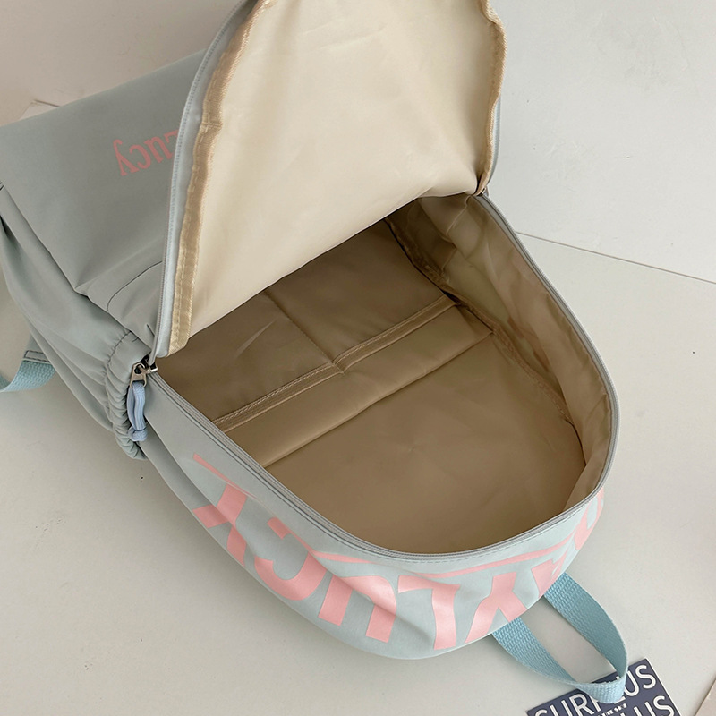 Cute and versatile letter schoolbag for female students, fashionable and casual class backpack, high appearance level, lightweight travel backpack for female students Application Scenario