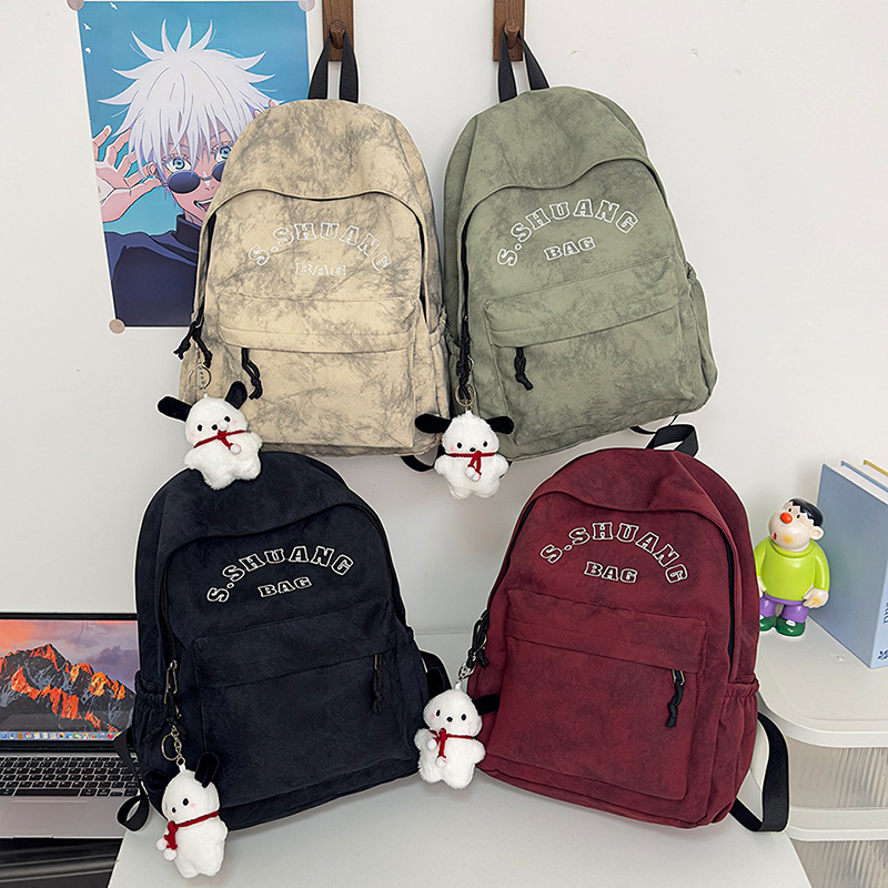 Korean InS-style solid color letter backpack 2025, Japanese Harajuku simple and versatile college student schoolbag for women Application Scenario