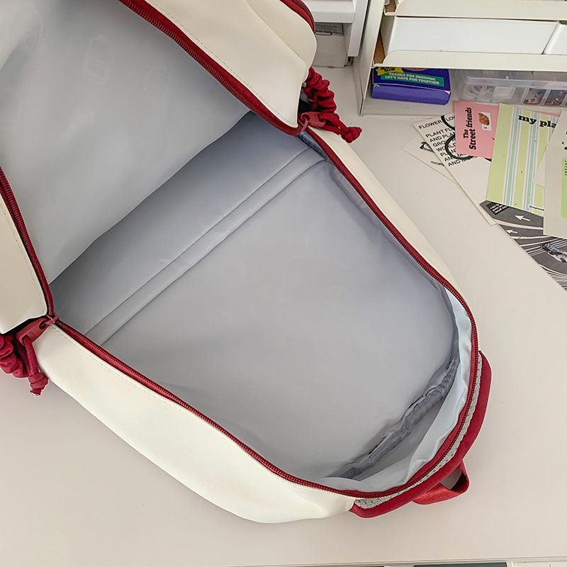 2024 New Korean version backpack with reduced load, color-matched large capacity short-distance travel backpack for college and high school students Application Scenario