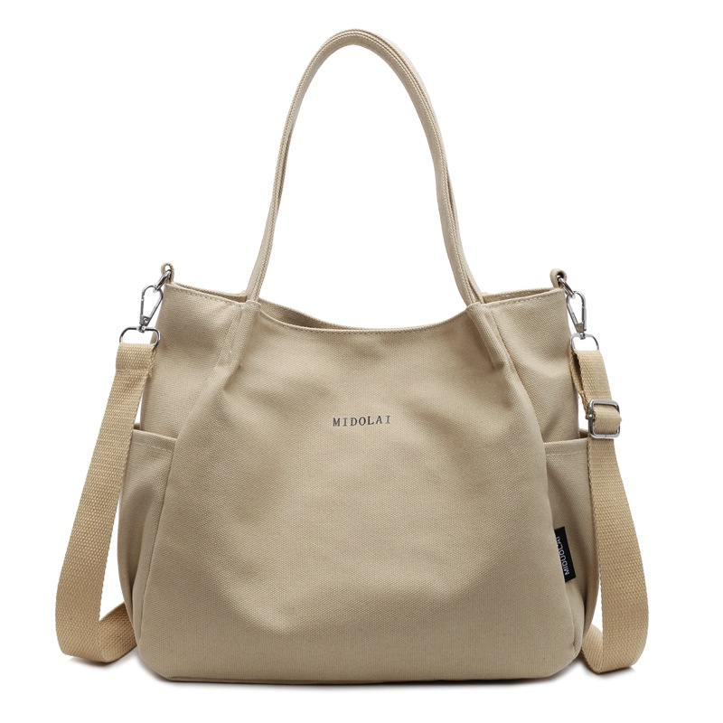 Korean large-capacity canvas bag, multi-pocket tote bag, fashionable commuting crossbody bag, solid-color casual single-shoulder bag Item Picture